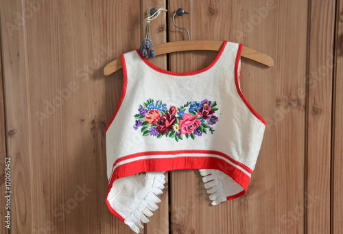 Fotografia Part of a slovak vintage national costume: a vest with a flower ornament embroid