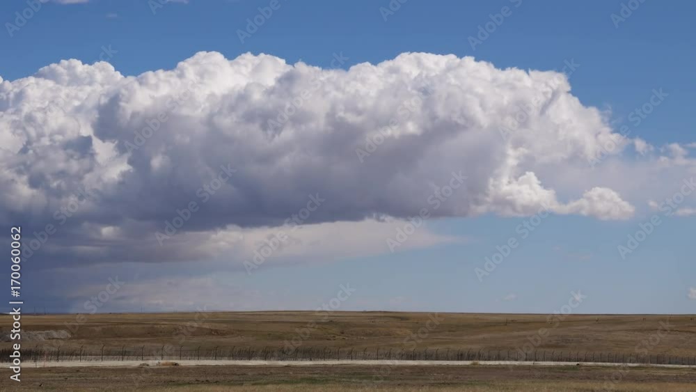 Churning Cumulus Clouds in Open Landscape Churning Cumulus Clouds in Open Landscape