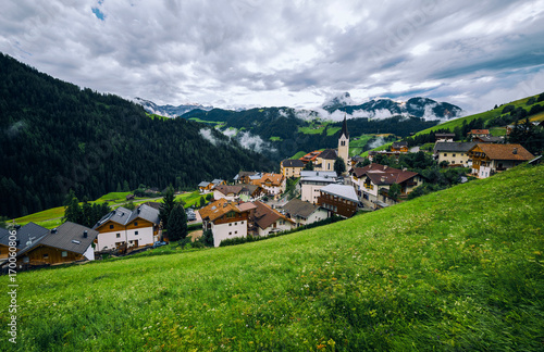 View of the Alpine village La Valle (La Val) in Dolomites. Trentino Alto Adidge, Italy. © Oles