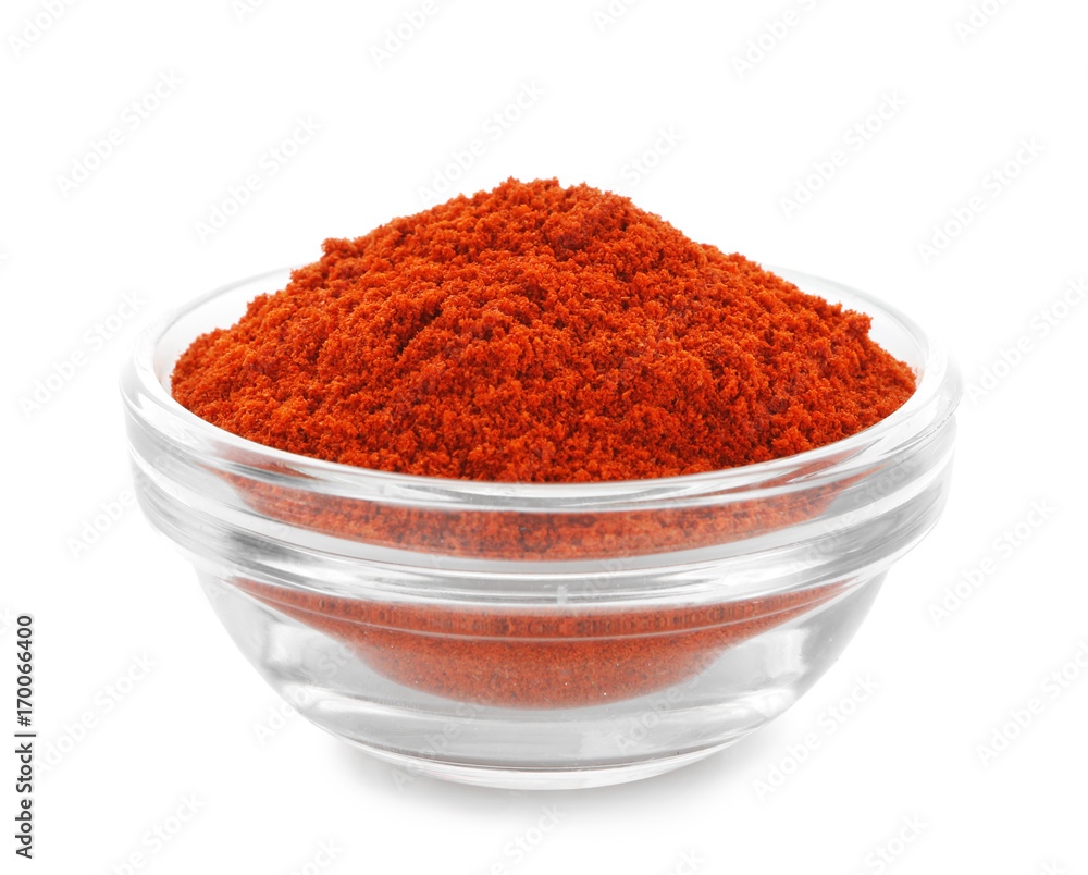Heap of chili powder in glass bowl isolated on white Heap of chili powder in glass bowl isolated on white