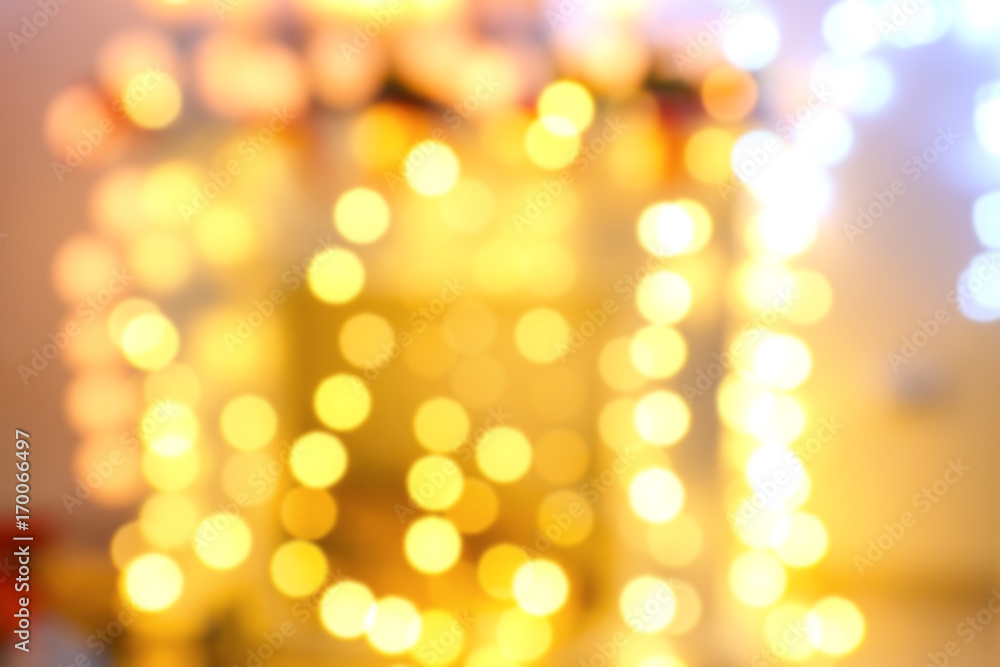 Obraz premium Blurred view of beautiful Christmas lights