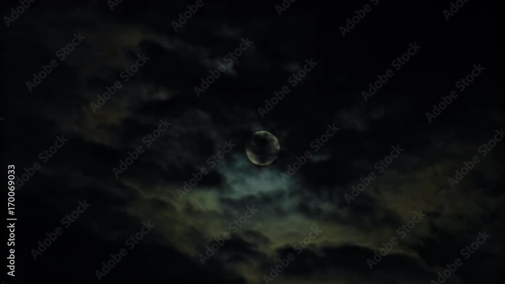 New moon and clouds in the pitchblack sky. Long shot New moon and clouds in the pitchblack sky. Long shot