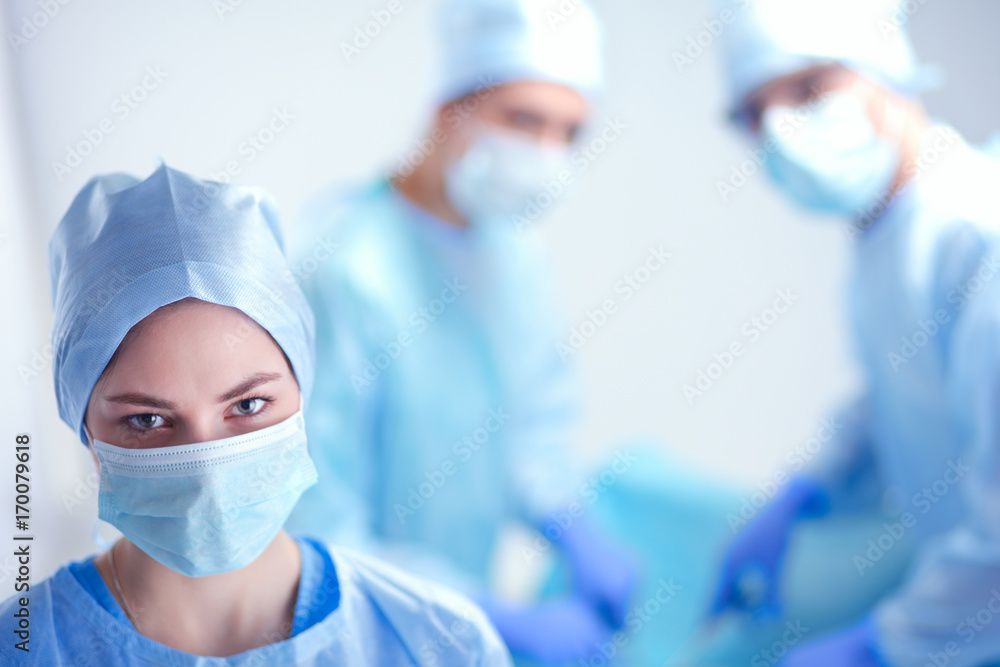 Team surgeon at work in operating room Team surgeon at work in operating room