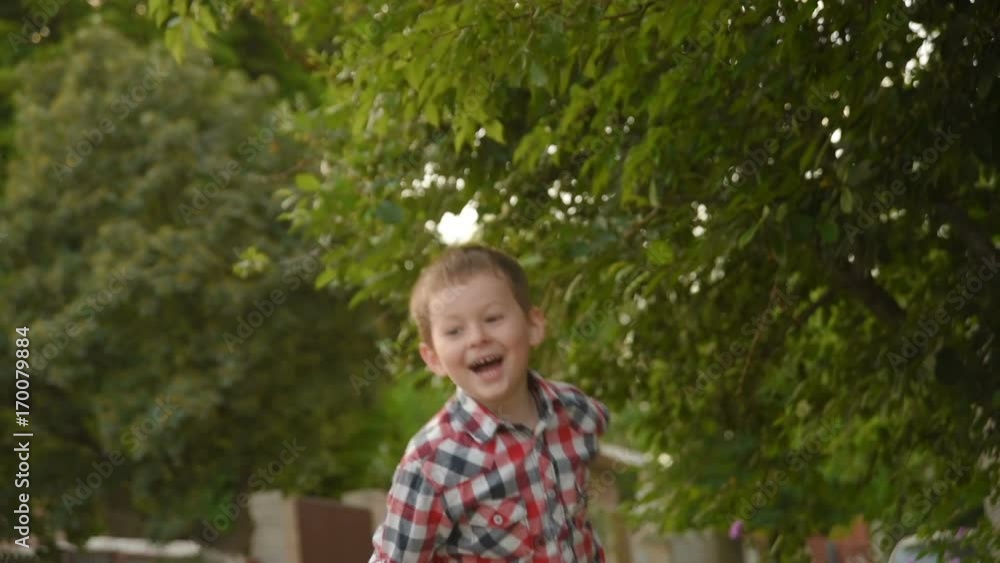 little boy launches a paper plane. slow motion little boy launches a paper plane. slow motion