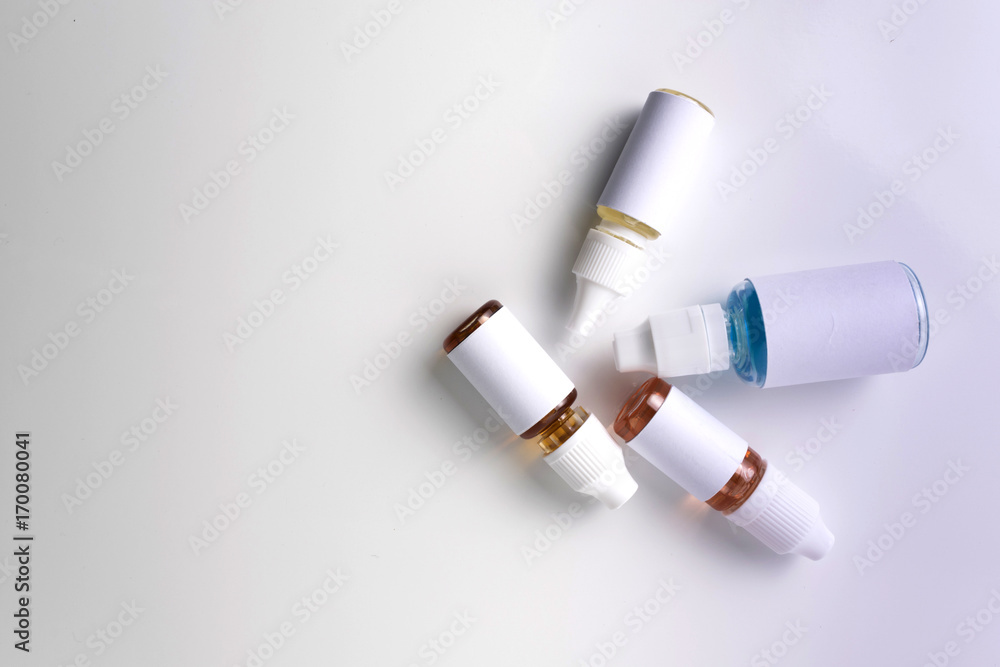 Isolated e liquid bottles for vape devices on a white background