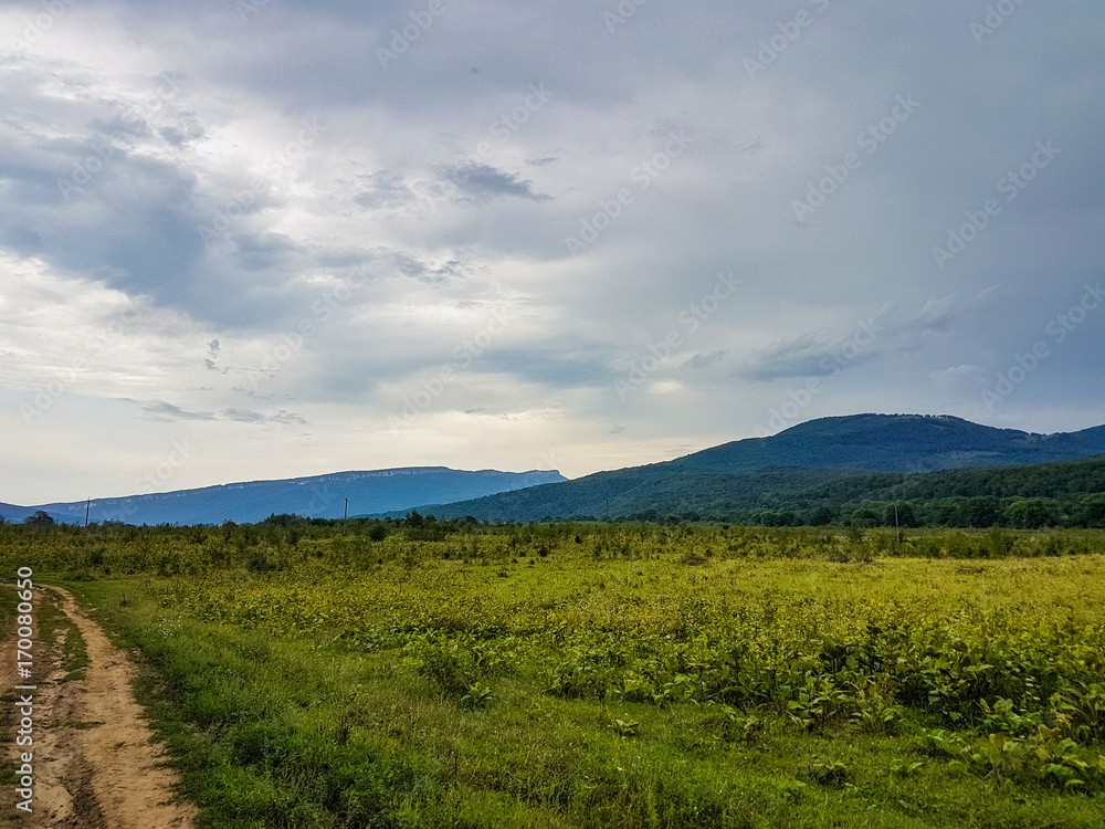Mountain forest landscape at the foot of the Caucasus Mountains, Adygea, Russia Mountain forest landscape at the foot of the Caucasus Mountains, Adygea, Russia