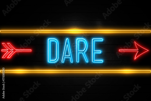 Dare  - fluorescent Neon Sign on brickwall Front view
