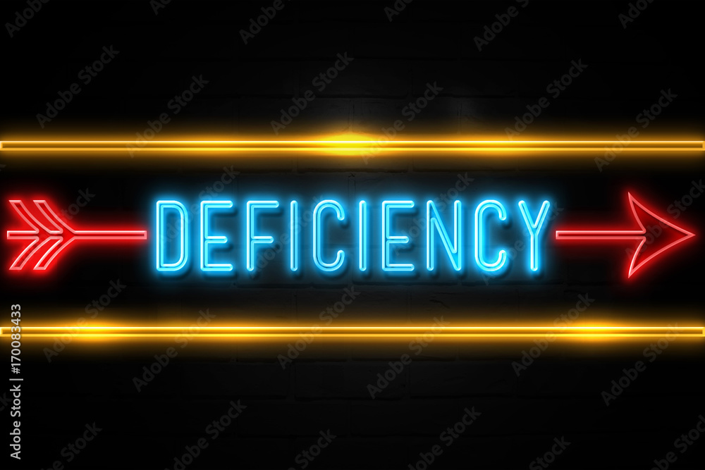 Deficiency  - fluorescent Neon Sign on brickwall Front view