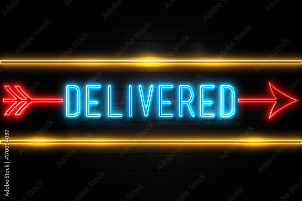 Delivered - fluorescent Neon Sign on brickwall Front view Delivered - fluorescent Neon Sign on brickwall Front view