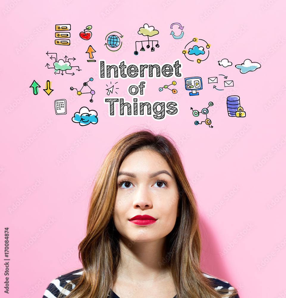 Internet of Things text with young woman on a pink background Internet of Things text with young woman on a pink background