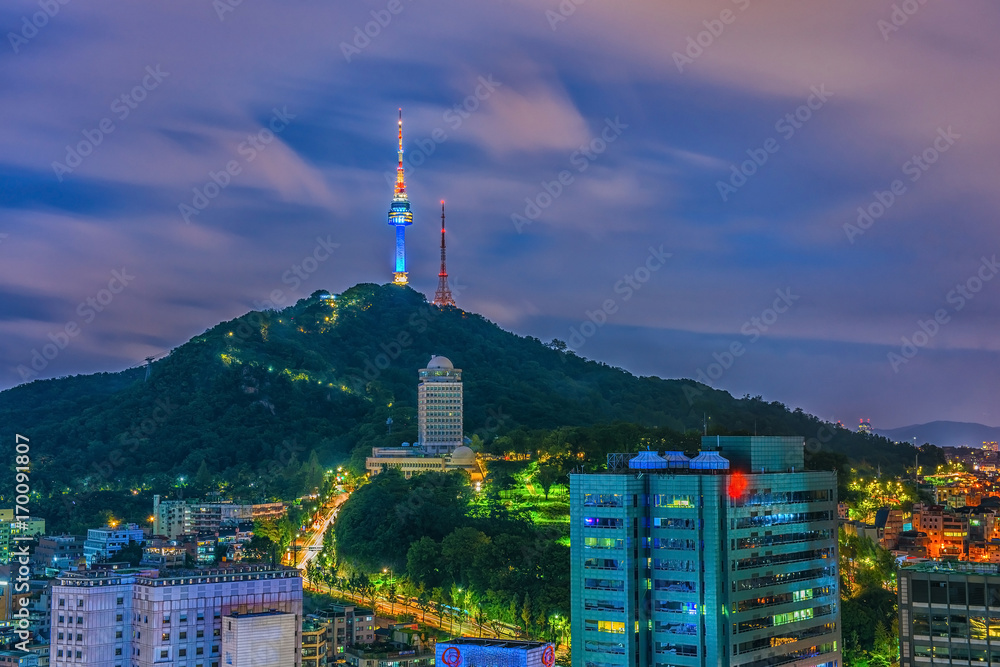 View of sunset in seoul city with seoul tower at namsan public park. 
