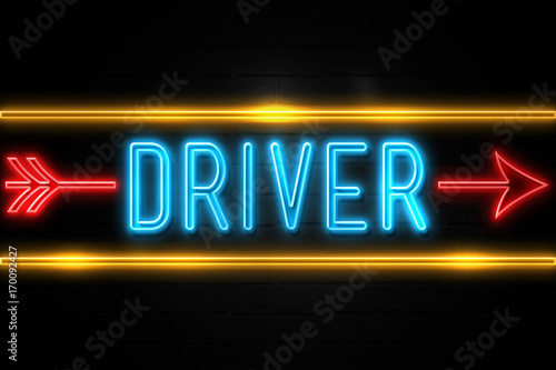 Driver  - fluorescent Neon Sign on brickwall Front view