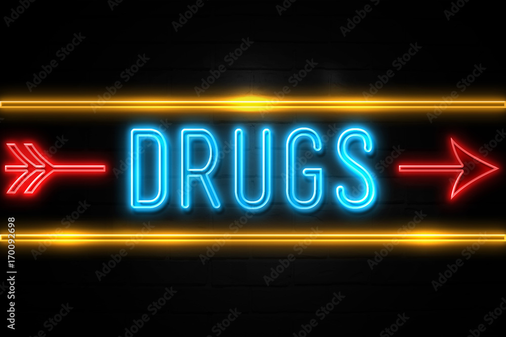 Drugs - fluorescent Neon Sign on brickwall Front view Drugs - fluorescent Neon Sign on brickwall Front view