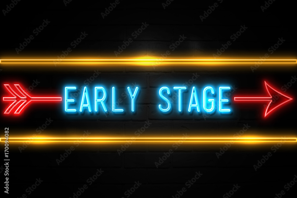 Fototapeta premium Early Stage - fluorescent Neon Sign on brickwall Front view