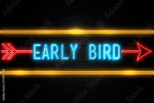 Early Bird  - fluorescent Neon Sign on brickwall Front view