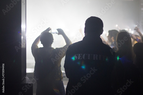 security man doing his job on concert