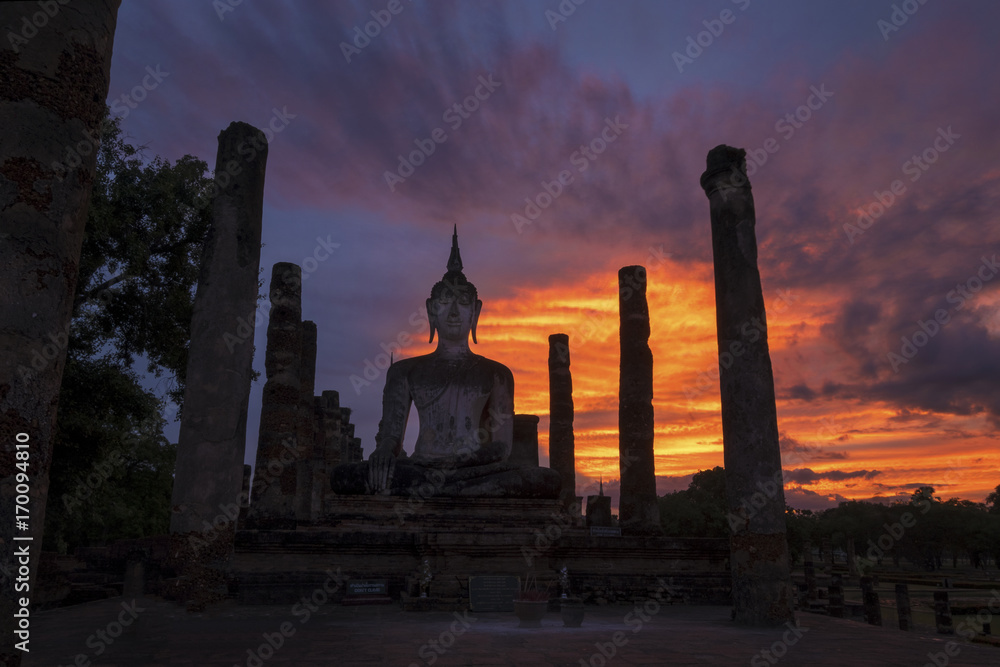 Big buddha in sunset at Sukhothai Historical Park, Sukhothai, Thailand