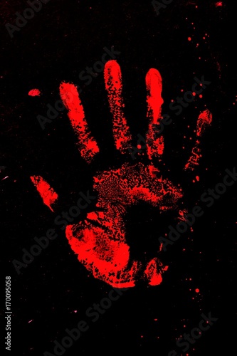 Set of red hand prints on black background