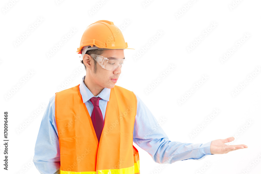 Young confident asian man, orange safety hat, orange safety jacket, safety glass, red tie, blue shirt on white posing open hand. Young confident asian man, orange safety hat, orange safety jacket, safety glass, red tie, blue shirt on white posing open hand.