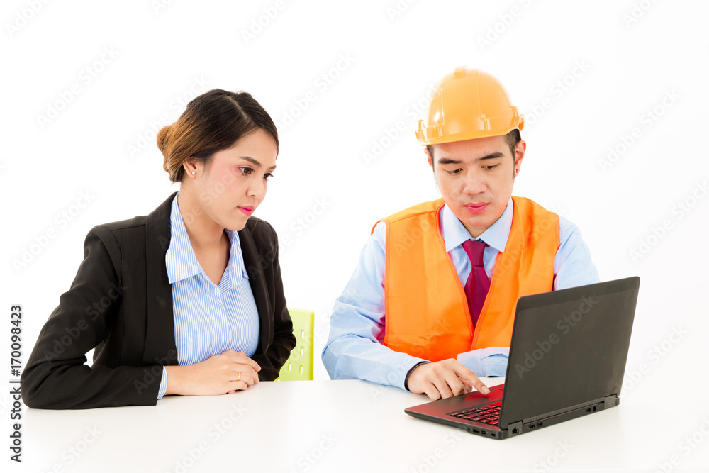 Young Asian male engineer talking to female business woman on white background. Young Asian male engineer talking to female business woman on white background.