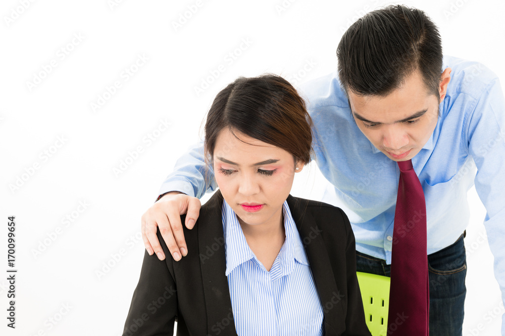 Young confident Asian office employee business man red tie touch attractive Asian woman on the shoulder. Young confident Asian office employee business man red tie touch attractive Asian woman on the shoulder.