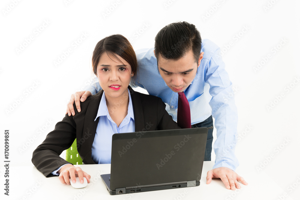 Young confident Asian office employee business man red tie touch attractive Asian woman on the shoulder. Young confident Asian office employee business man red tie touch attractive Asian woman on the shoulder.