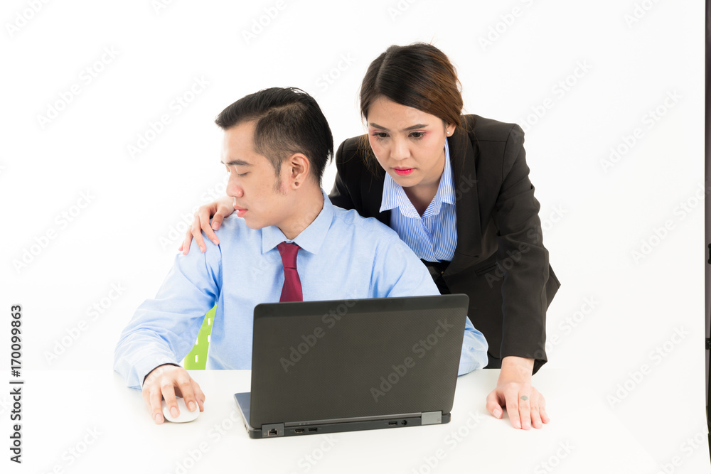 Young confident Asian office employee business woman touch attractive Asian office man on the shoulder. Young confident Asian office employee business woman touch attractive Asian office man on the shoulder.