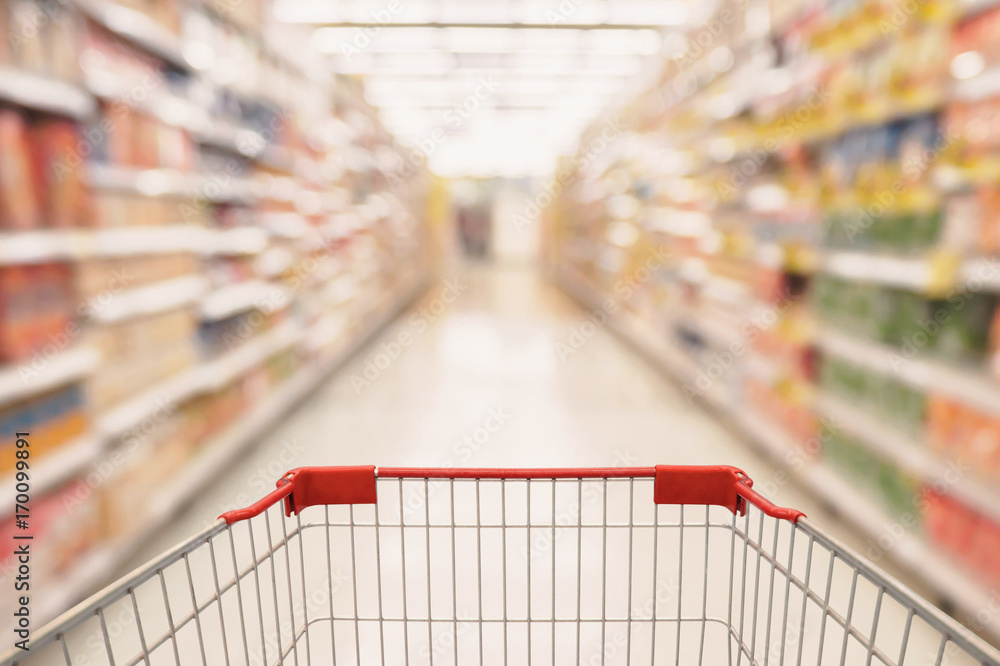 Abstract Supermarket aisle with empty shopping cart Abstract Supermarket aisle with empty shopping cart