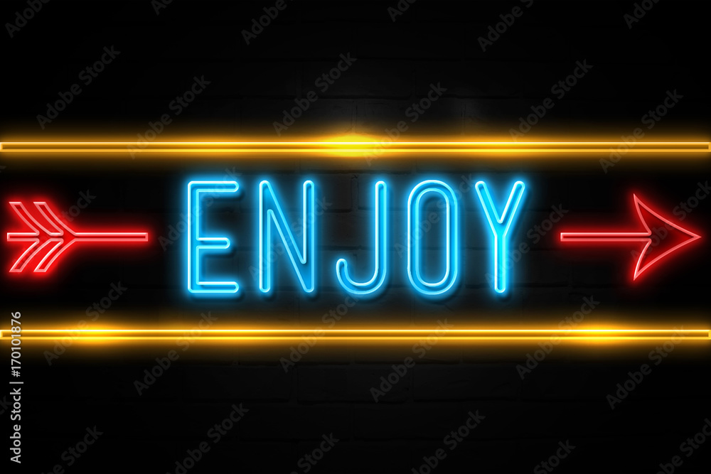 Enjoy - fluorescent Neon Sign on brickwall Front view Enjoy - fluorescent Neon Sign on brickwall Front view