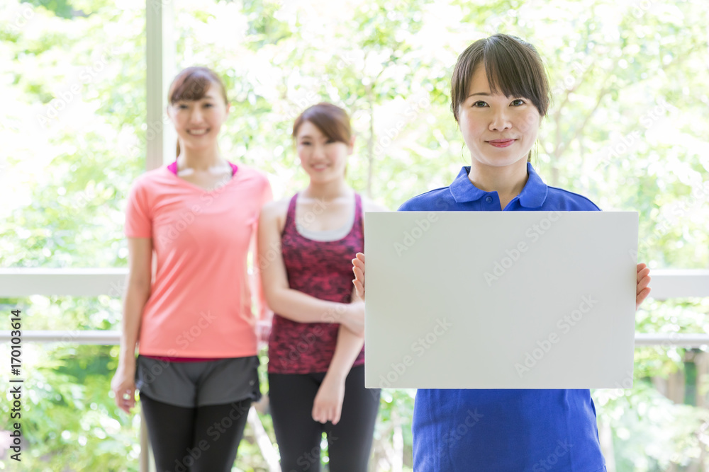 attractive asian woman in sports gym attractive asian woman in sports gym