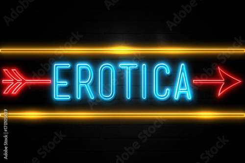 Fotografija Erotica  - fluorescent Neon Sign on brickwall Front view