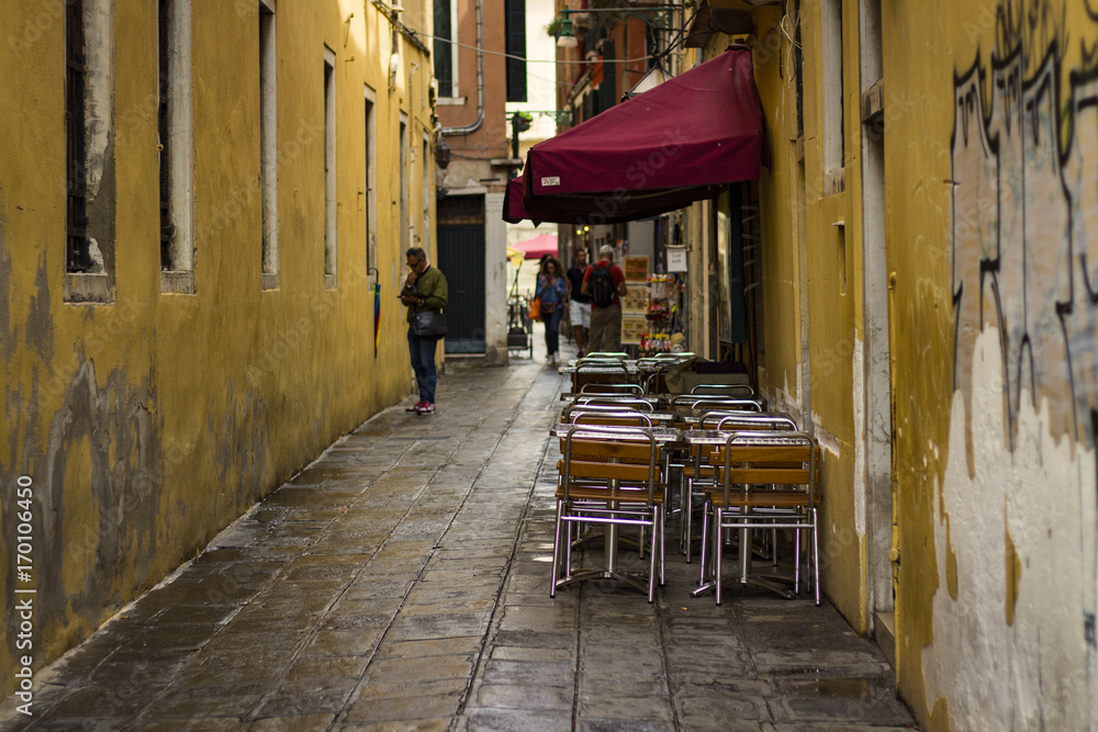 Street cafe in a narrow street