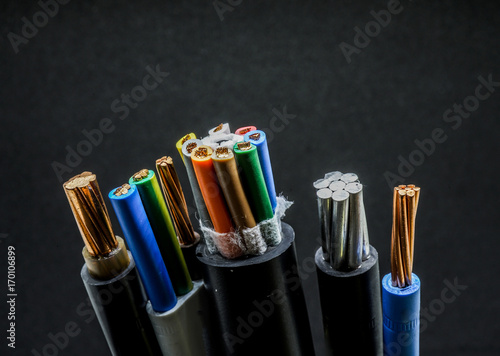 Wires and copper with black background in the studio.
