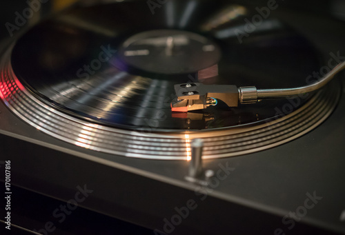 A modern turntable to play music on audio disc. Hifi audiophile turn table device