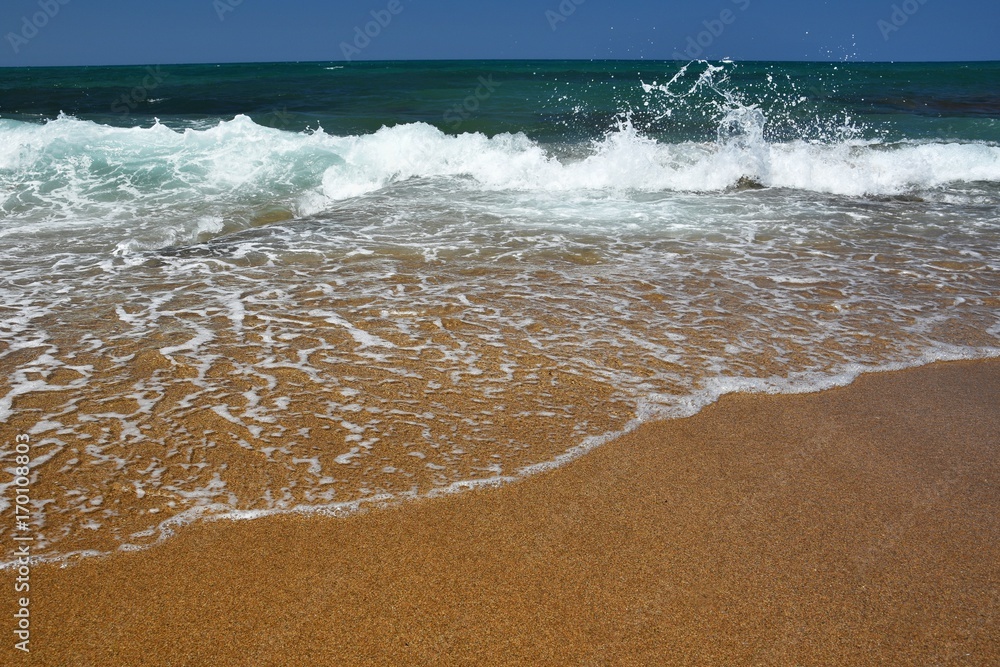 Beautiful clean sea and waves. Summer background for travel and holidays. Greece Crete.. Amazing scenery on the beach. Beautiful clean sea and waves. Summer background for travel and holidays. Greece Crete.. Amazing scenery on the beach.
