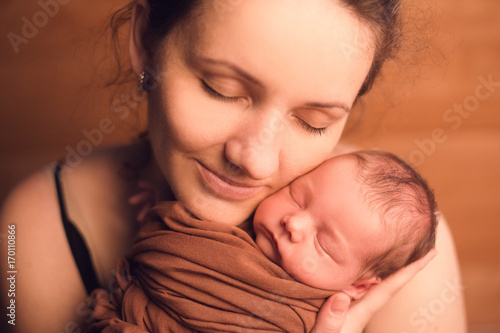 mother and newborn baby daughter son