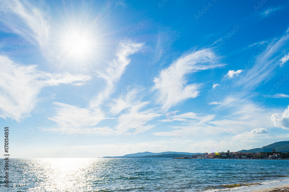 Obraz premium Sun shining over Alghero shore