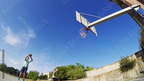 Players warming up in a basketball playground