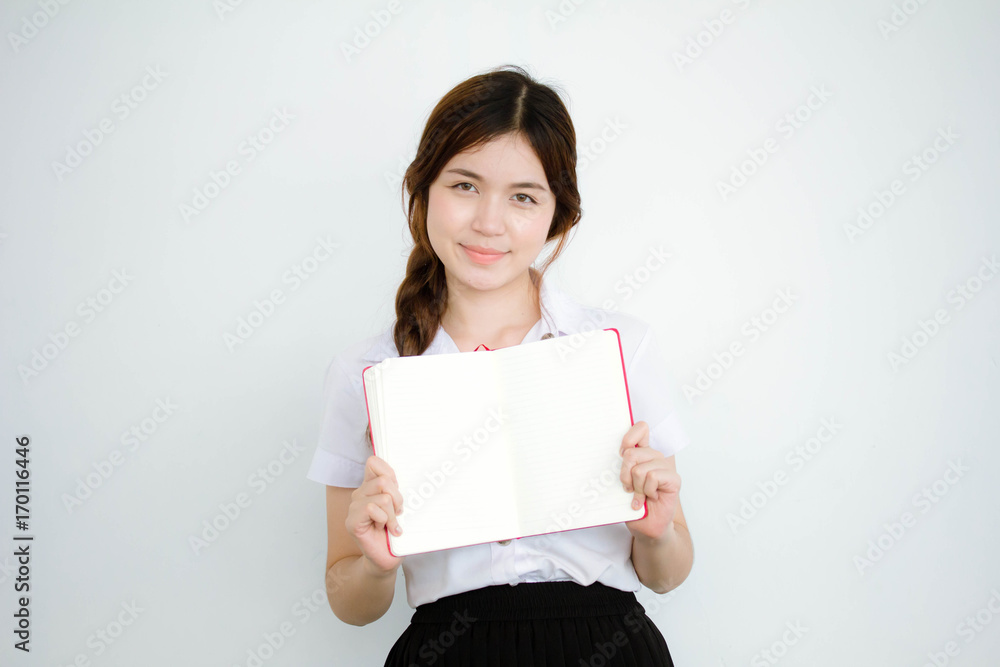 Portrait of thai adult student university uniform beautiful girl show her book Portrait of thai adult student university uniform beautiful girl show her book