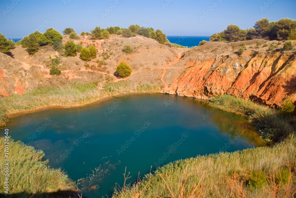 Lake near a quarry of bauxite, Italy