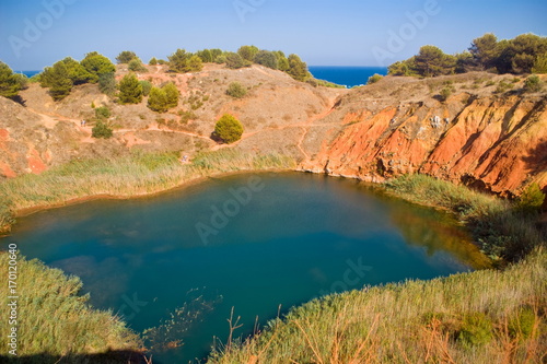 Lake near a quarry of bauxite, Italy