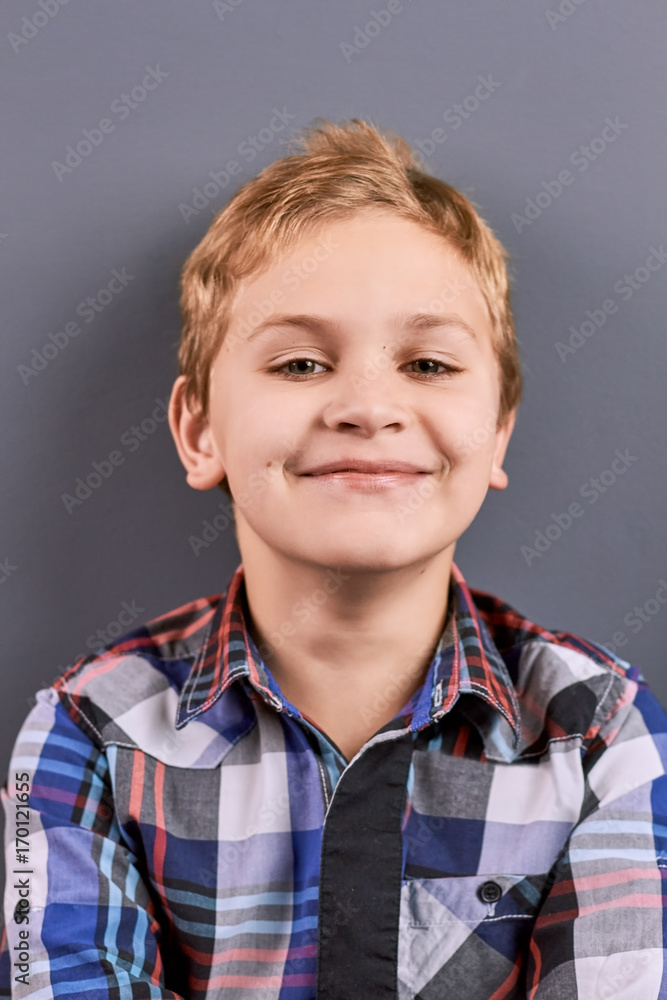 Beautiful handsome little boy, portrait. Studio shot of cute happy little boy, close up face. Handsome kid with blond hair. Beautiful handsome little boy, portrait. Studio shot of cute happy little boy, close up face. Handsome kid with blond hair.