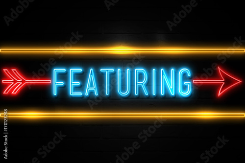 Фотография Featuring  - fluorescent Neon Sign on brickwall Front view