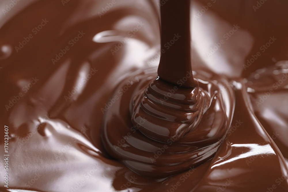 pouring melted premium dark chocolate pouring melted premium dark chocolate