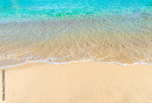 Summer Holiday background, beautiful sand beach with turquoise tropical sea water