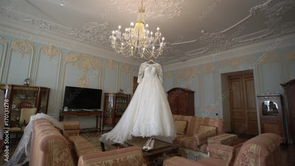 Wedding beautiful dress in bedroom shot Wedding beautiful dress in bedroom shot