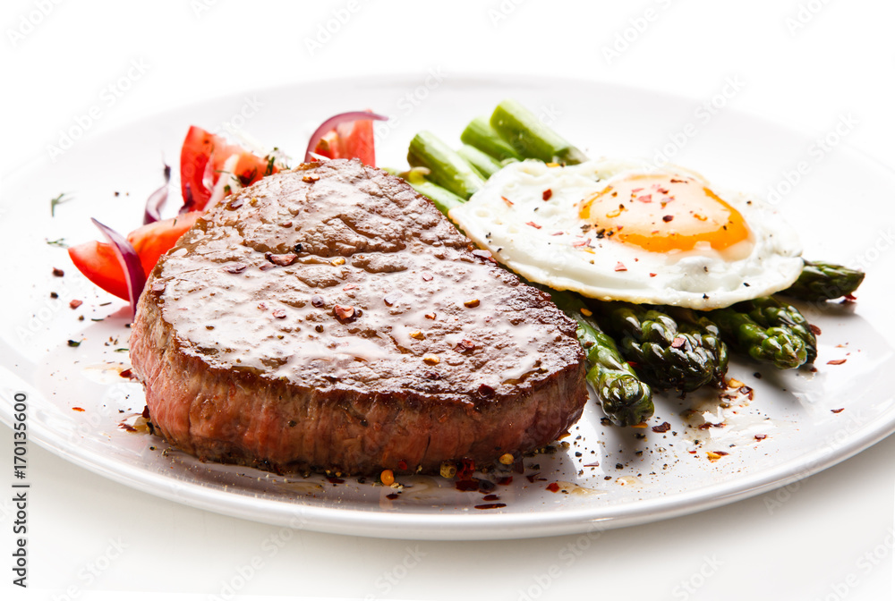Grilled steak with asparagus and fried egg Grilled steak with asparagus and fried egg