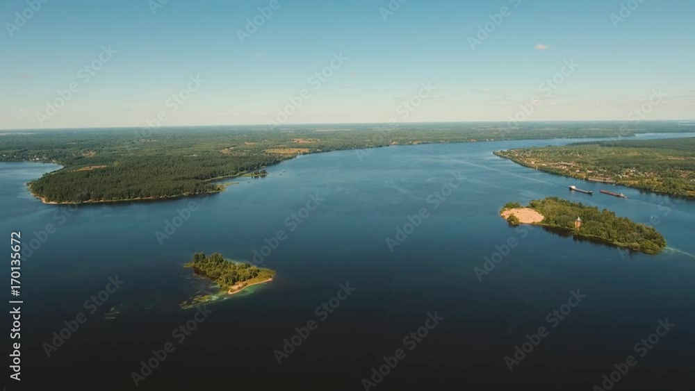 Rural landscape, sky, lake, river, forest, field. Aerial view lake with islands against the blue sky. drone footage, 4k Rural landscape, sky, lake, river, forest, field. Aerial view lake with islands against the blue sky. drone footage, 4k
