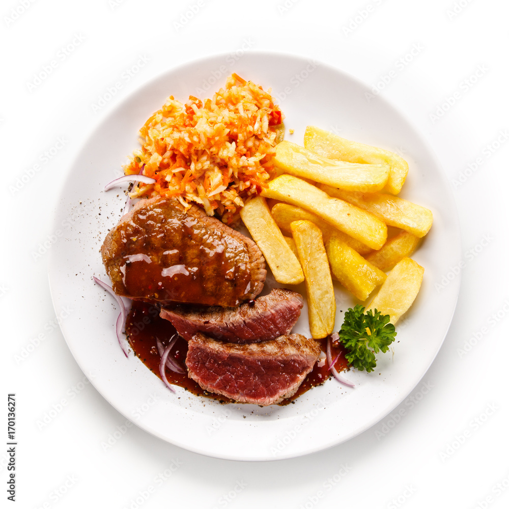 Grilled steak with french fries on white background Grilled steak with french fries on white background