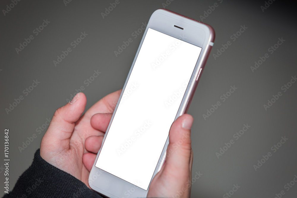 Baby's hand hold smartphone and white blank space for input text Baby's hand hold smartphone and white blank space for input text